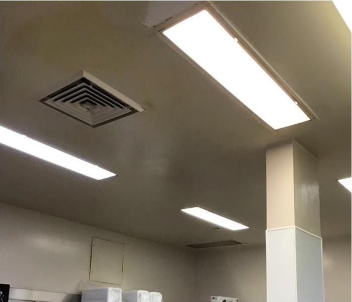 Grease build up on a restaurant kitchen ceiling