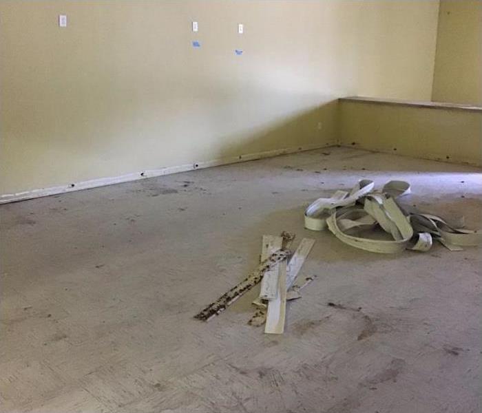 Commercial building has had flooring and baseboards removed due to water loss